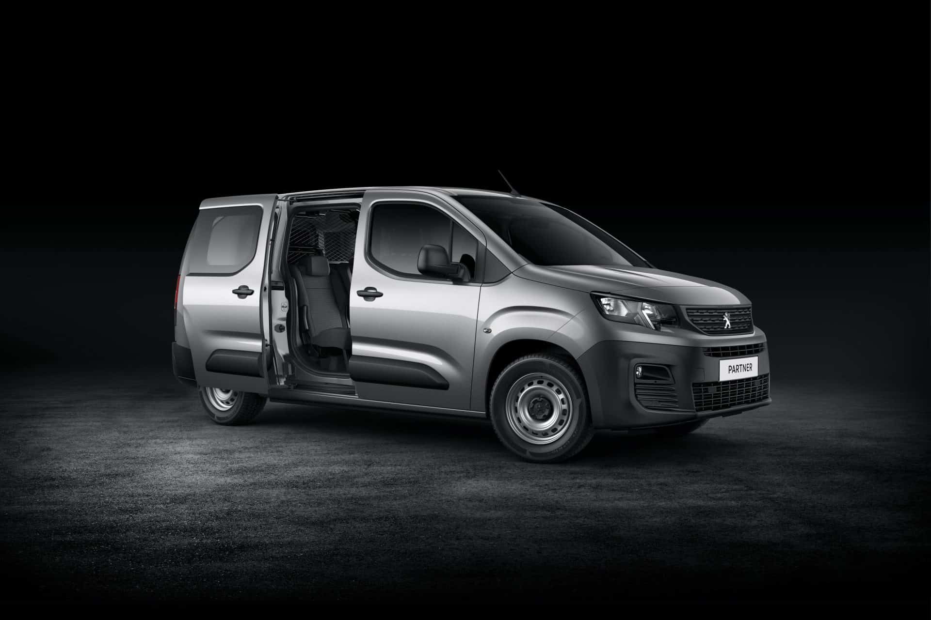 Grey Peugeot Partner on a Gravel Floor
